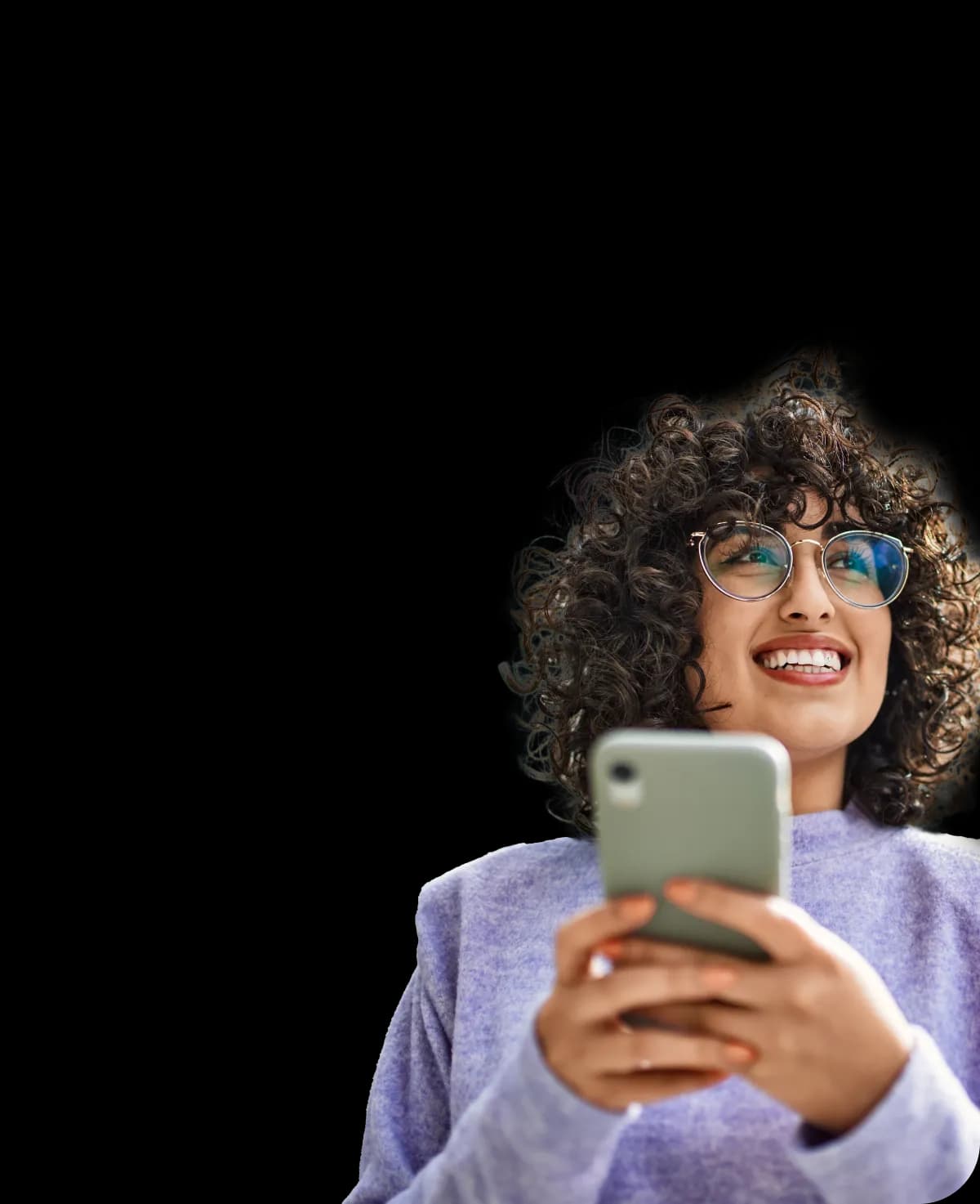 Woman using smartphone and smiling